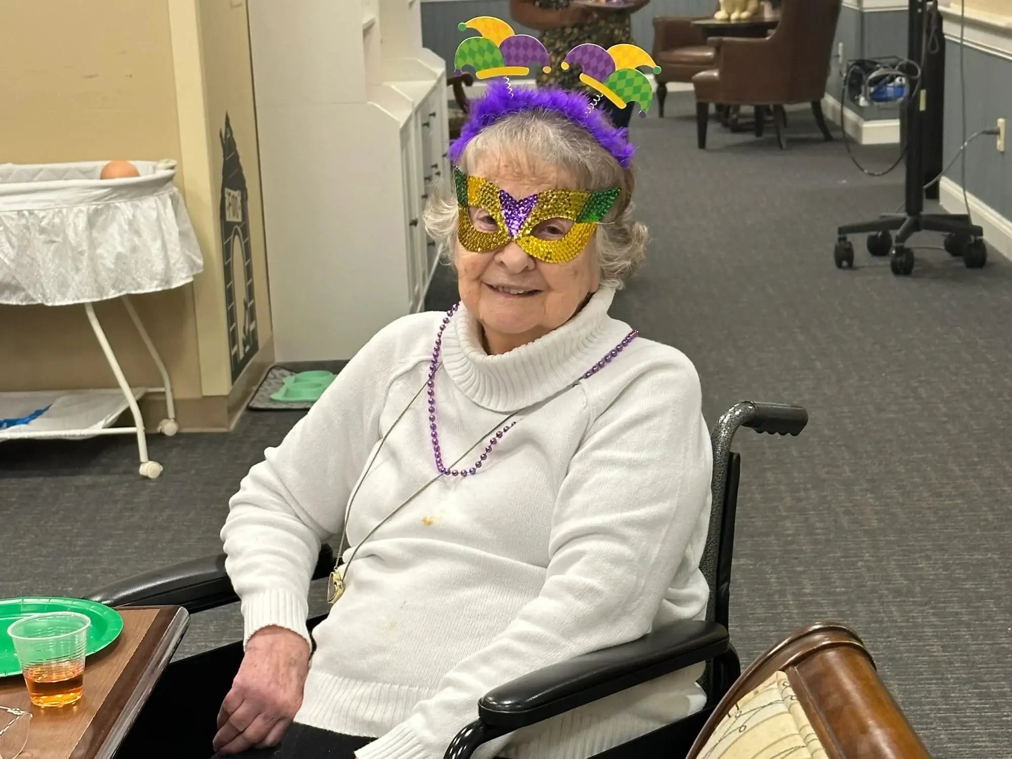 Burnie wearing a Mardi Gras mask Burnie wearing a Mardi Gras mask