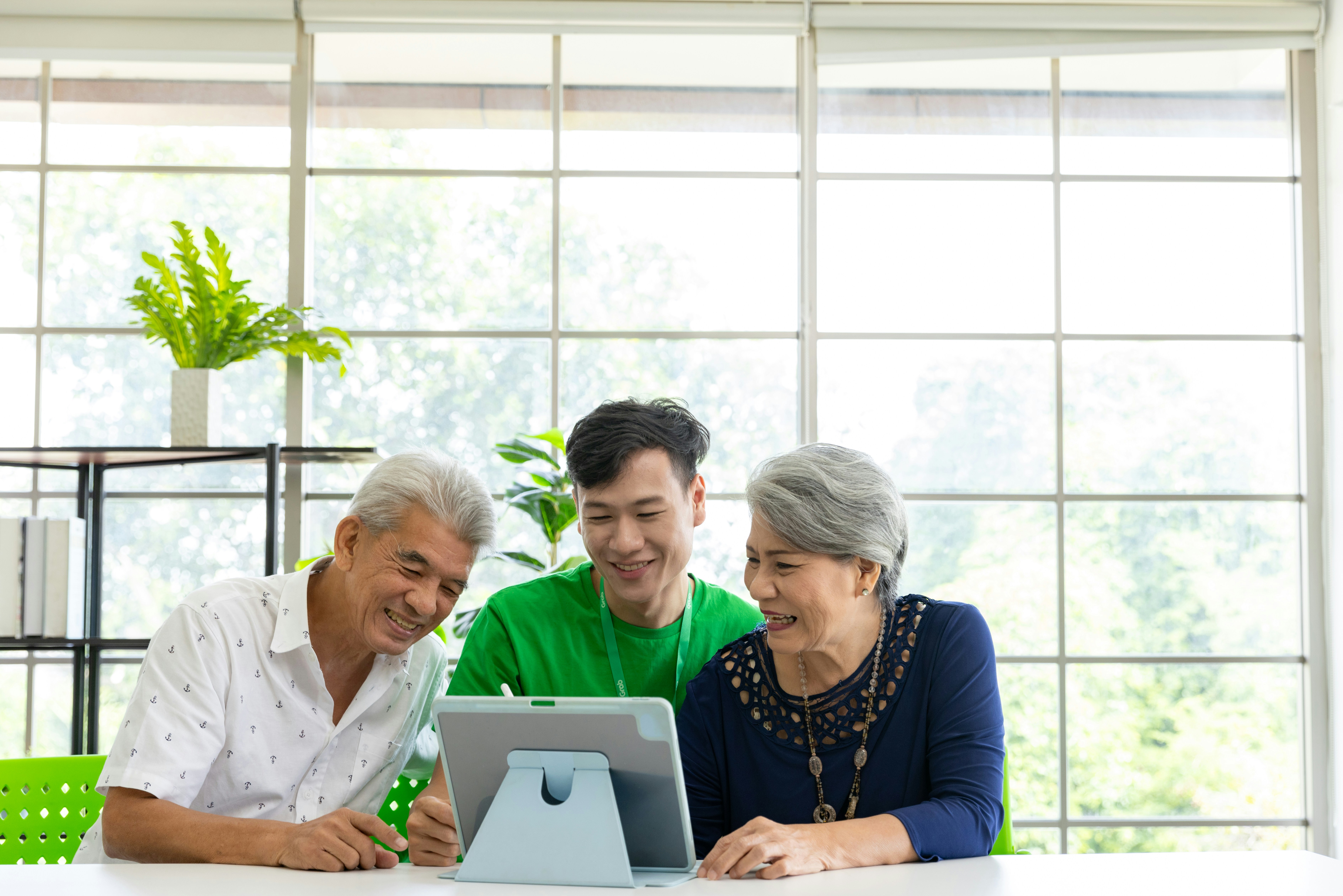 Family researching senior care options on a laptop - local senior care